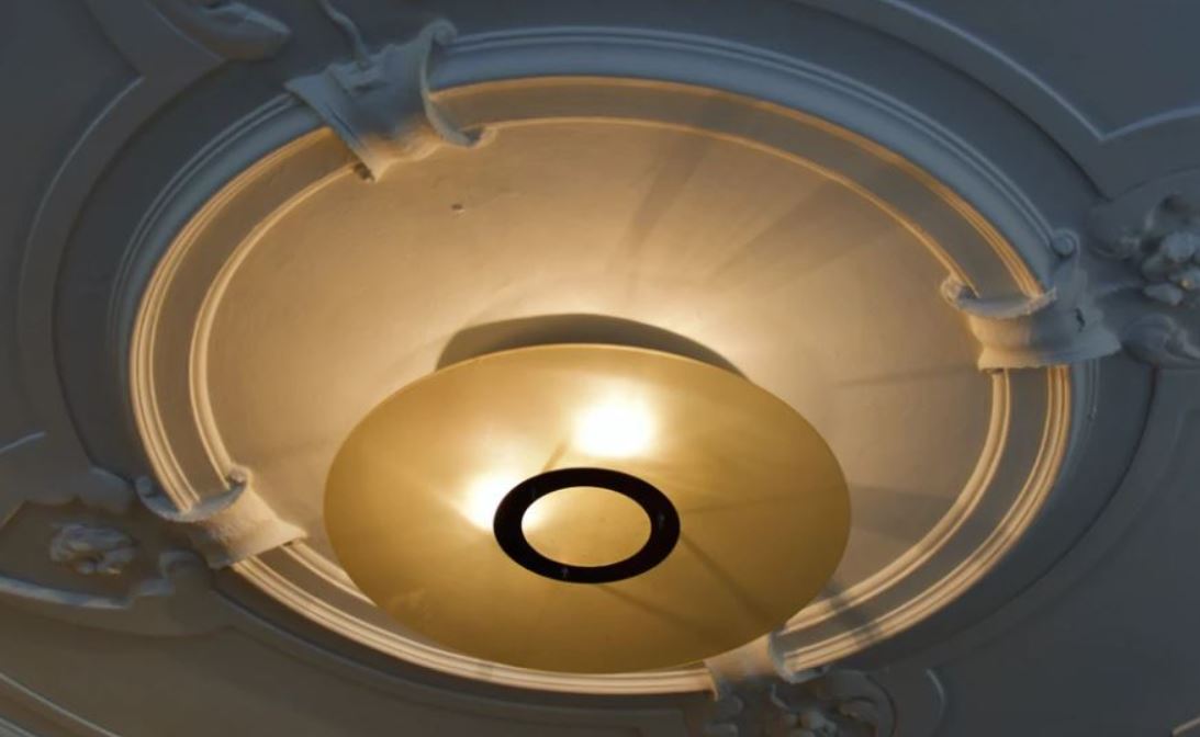 a grand ceiling rose light fitting